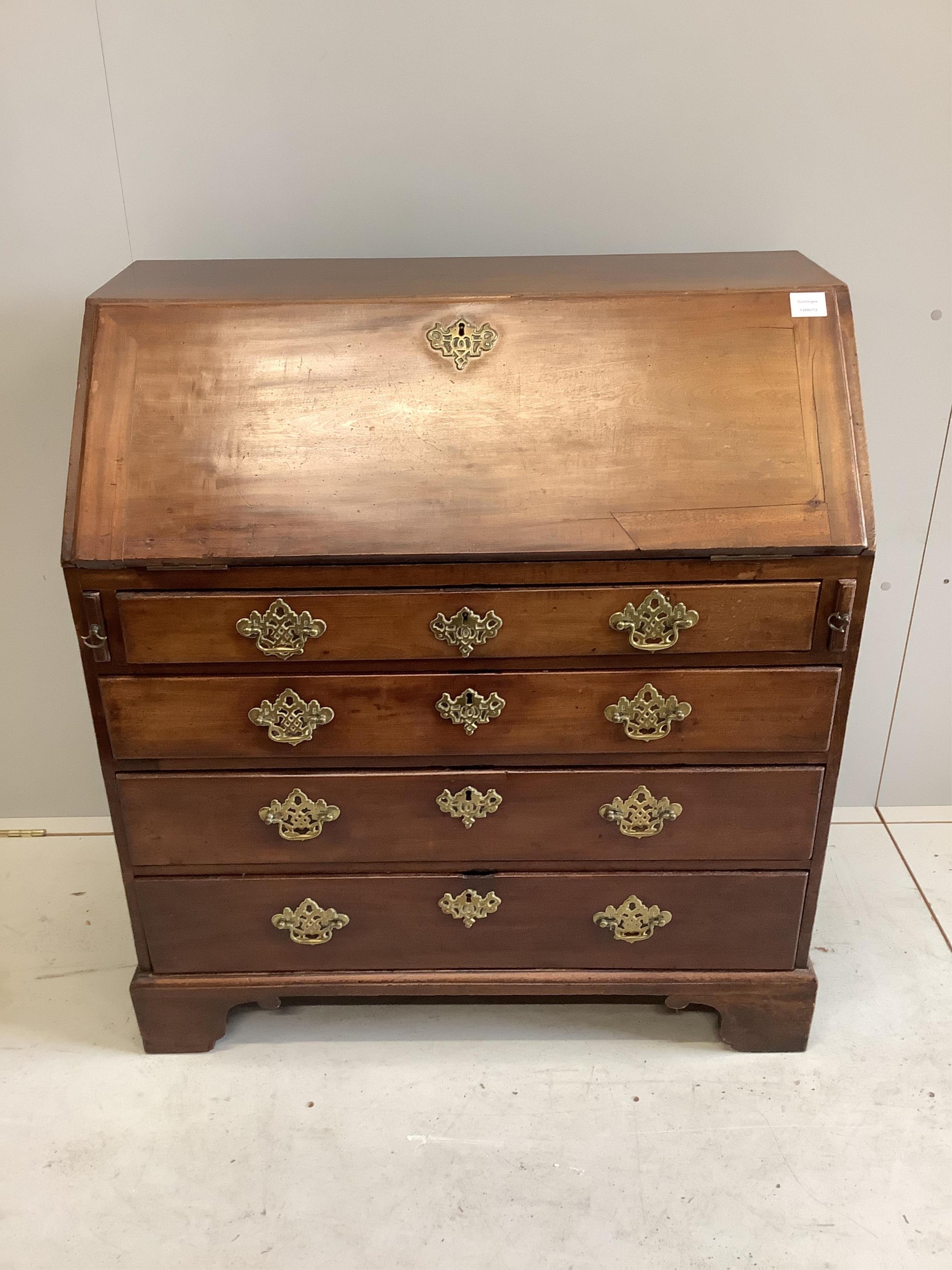 A George III mahogany bureau, width 90cm. Condition - fair to good, but faded at the top